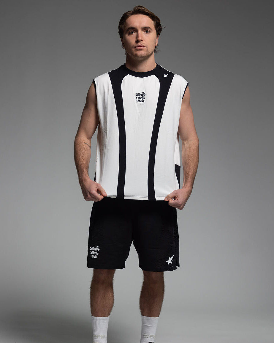 Athlete wearing Trew Collections English Nostalgia set. Front facing against grey backdrop.